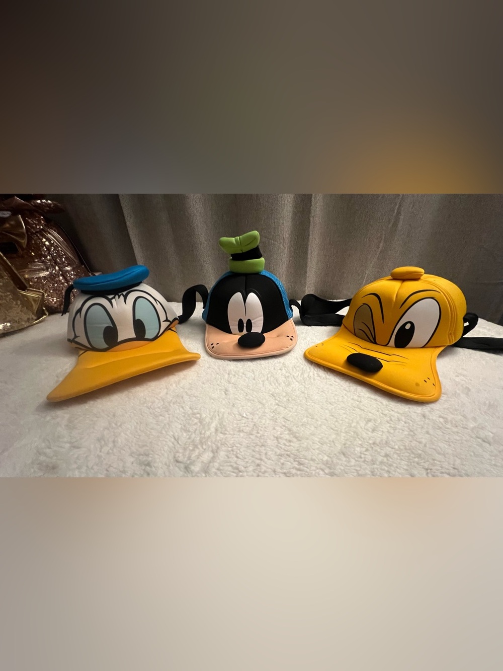 Disney parks Goody, Donald, Pluto hats used but great condition.